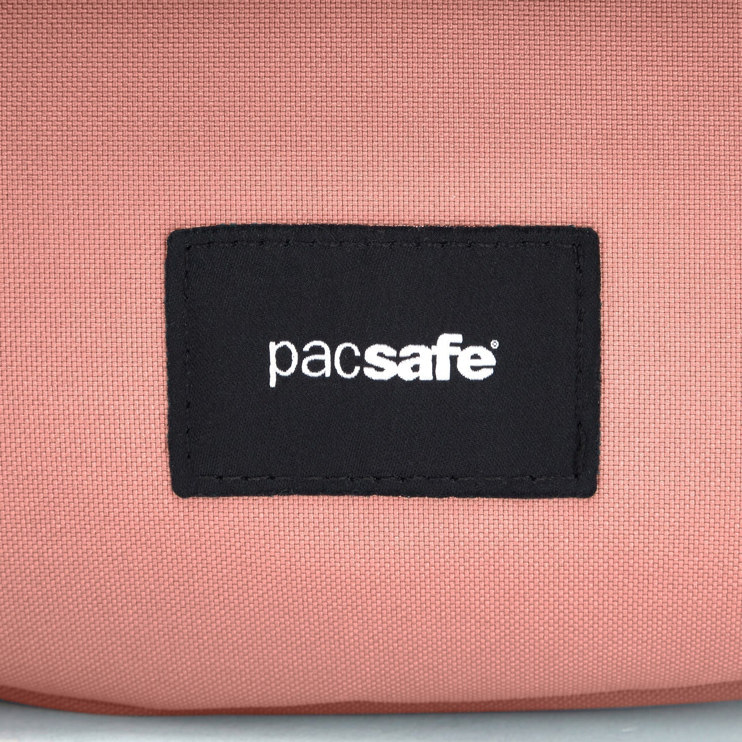 Product image of Pacsafe® GO anti-theft crossbody pouch Pacsafe® GO anti-theft crossbody pouch, Rose