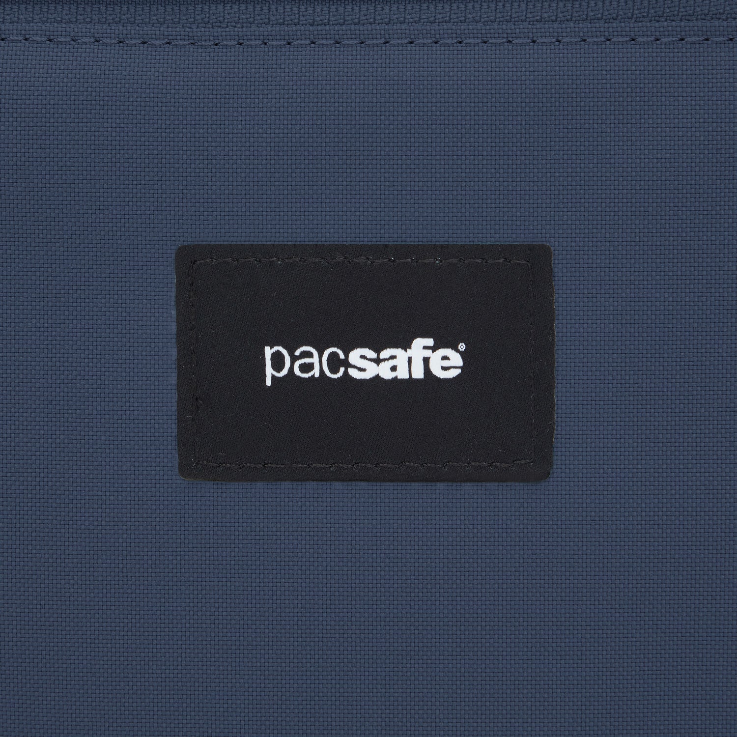 Product image of Pacsafe® GO anti-theft crossbody pouch Pacsafe® GO anti-theft crossbody pouch