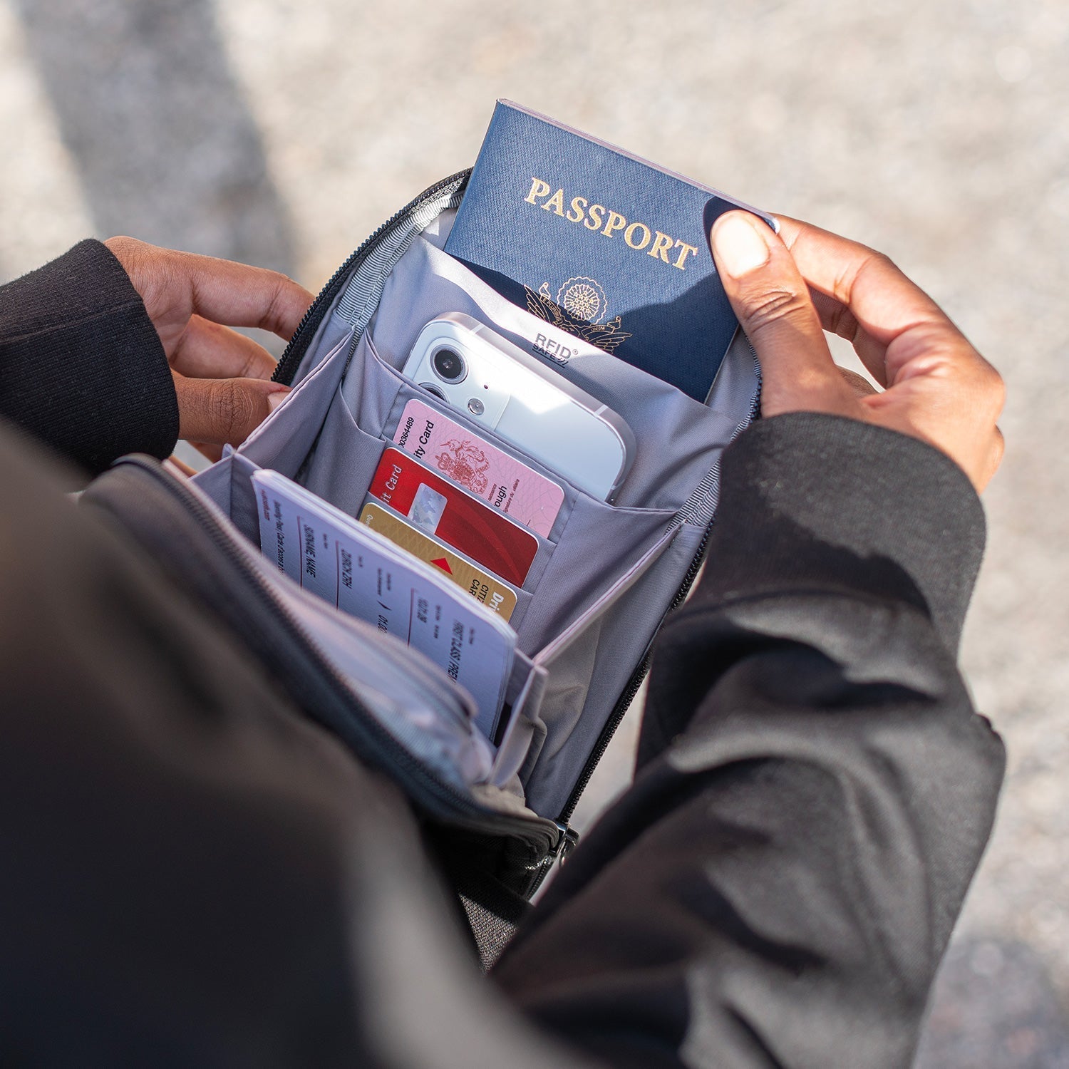 Product image of Pacsafe® RFIDsafe™ RFID blocking tech crossbody Pacsafe® RFIDsafe™ RFID blocking tech crossbody