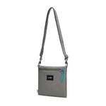Pacsafe® GO anti-theft crossbody pouch, Stone