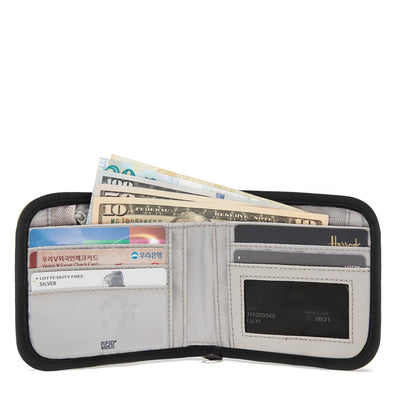 Pacsafe® RFIDsafe™ V100 RFID blocking bifold wallet (lifestyle)